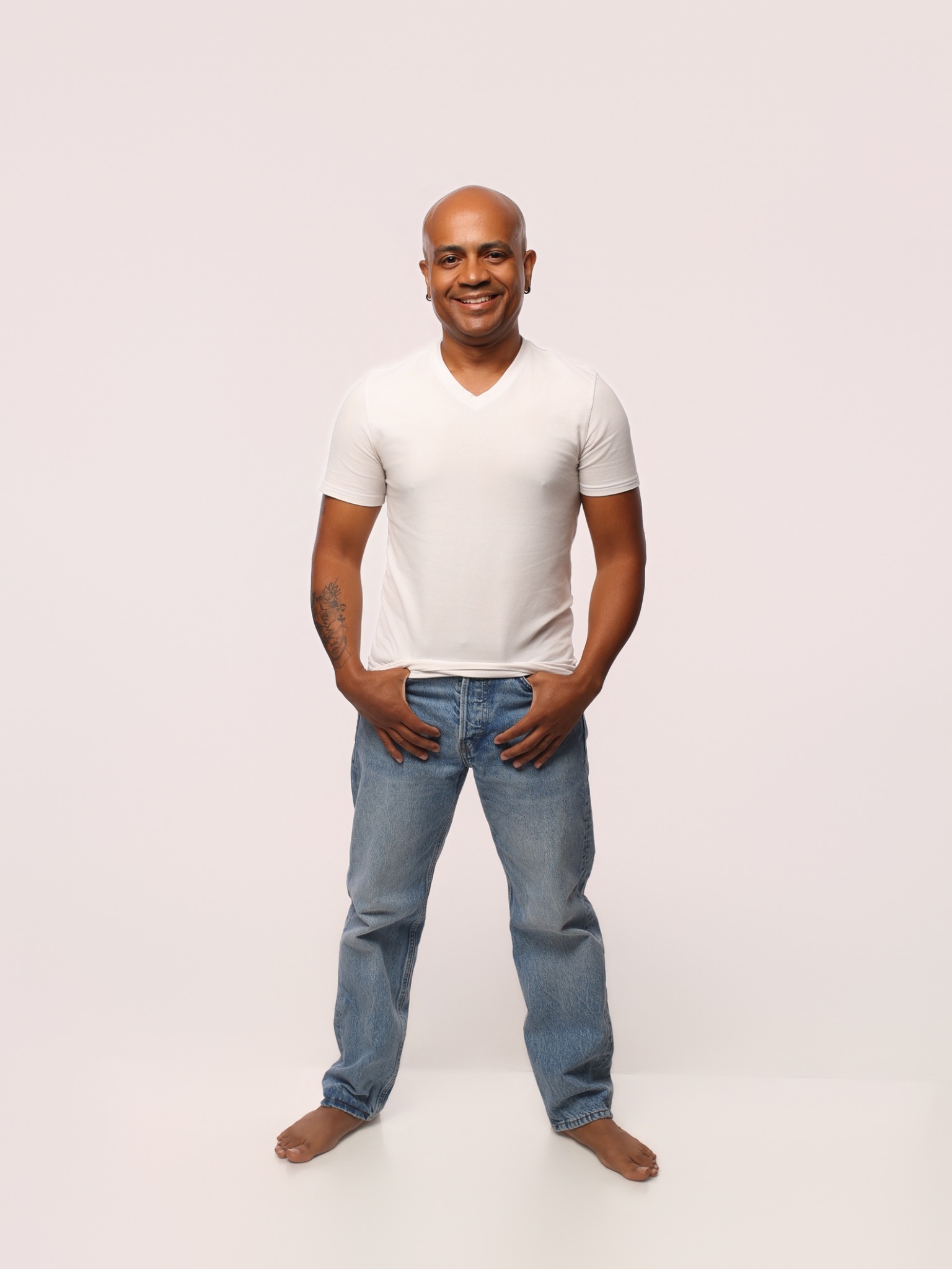 Full-body studio portrait of Eric Velez